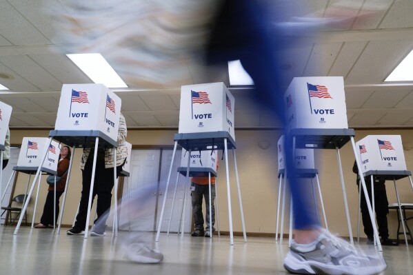 People vote, Nov. 5, 2024, in Oak Creek, Wis. (AP Photo/Morry Gash, File)