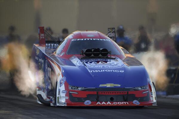 In this photo provided by the NHRA, Robert Hight drives in Funny Car qualifying Friday, Nov. 12, 2021, at the Auto Club NHRA Finals drag races at Auto Club Raceway in Pomona, Calif. (Marc Gewertz/NHRA via AP)