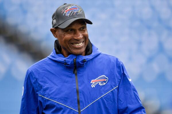 FILE - Buffalo Bills defensive coordinator Leslie Frazier walks on the field before an NFL football game against the Houston Texans, on Oct. 3, 2021, in Orchard Park, N.Y. Frazier is credited for providing the Bills a calm and reassuring voice even at the the most troubling times. (AP Photo/Adrian Kraus, File)