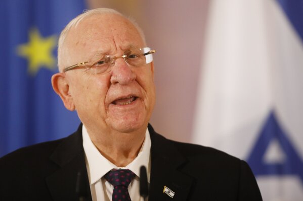 FILE - In this March 16, 2021 file photo, Israeli President Reuven Rivlin addresses the media during a meeting with German President Frank-Walter Steinmeier at Bellevue Palace in Berlin, Germany. Rivlin announced Monday, March 29, 2021, that he will begin consultations next week with Israel's political rivals in hopes of unraveling the country's post-election deadlock. Israel's presidency is largely a figurehead office. But after national elections, the president is responsible for choosing the leader of the party with the best chance of forming a government to put together a majority coalition in the 120-seat parliament. (AP Photo/Markus Schreiber, File)