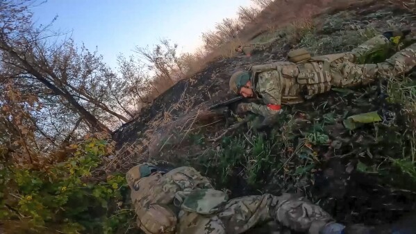 In this image from video released by the Russian Defense Ministry on Nov. 7, 2024, Russian Army soldiers fight with Ukrainian Armed forces in the Sudzhansky district of the Kursk region of Russia. (Russian Defense Ministry Press Service via AP, File)