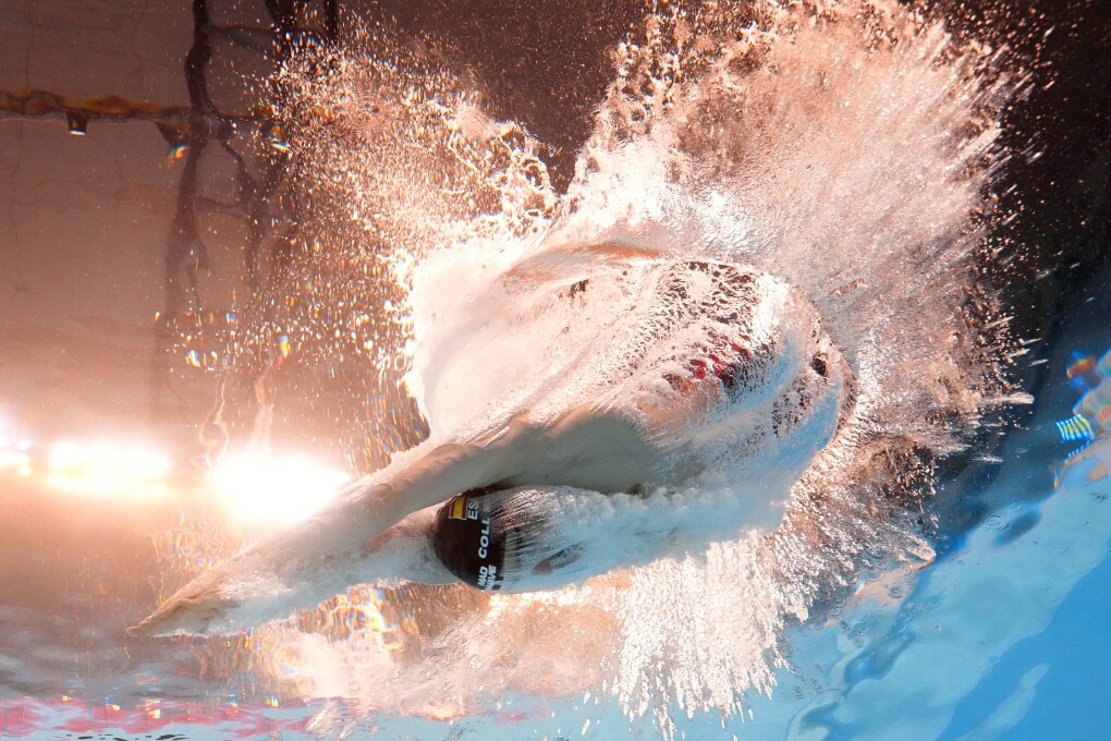 Carles Coll Marti of Spain competes in the men's 200-meter breaststroke heat at the World Aquatics Championships in Doha, Qatar, Thursday, Feb. 15, 2024. (AP Photo/Lee Jin-man)