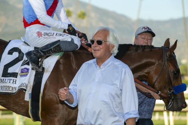 FILE - In this image provided by Benoit Photo, trainer Bob Baffert smiles after Muth (2), with Juan Hernandez aboard, won the Grade I $300,000 American Pharoah Stakes horse race Saturday, Oct. 7, 2023 at Santa Anita Park in Arcadia, Calif. A Kentucky appeals court judge on Wednesday, April 24, 2024, has denied Zedan Racing Stables’ requests for an emergency hearing and ruling that sought to allow Bob Baffert-trained Arkansas Derby winner Muth to run in next week’s Kentucky Derby at Churchill Downs. (Benoit Photo via AP, File)