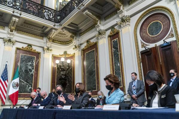 FILE - Vice President Kamala Harris, center, accompanied by from left, U.S. Ambassador to Mexico Ken Salazar, Homeland Security Secretary Alejandro Mayorkas, Secretary of State Antony Blinken, Commerce Secretary Gina Raimondo, and U.S. Trade Representative Katherine Tai, speaks at a U.S.-Mexico High Level Economic Dialogue meeting in the Indian Treaty Room in the Eisenhower Executive Office Building on the White House Campus in Washington, Thursday, Sept. 9, 2021. Mexico’s economy secretary on Thursday, Dec. 1, 2022, proposed yet another round of talks with the United States on a dispute over Mexico’s energy sector. (AP Photo/Andrew Harnik, File)