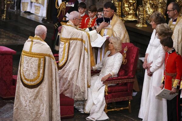 Queen Camilla is crowned with Queen Mary's Crown by The Archbishop of Canterbury the Most Reverend Justin Welby, in Westminster Abbey, London, Saturday May 6, 2023. (Yui Mok, Pool via AP)