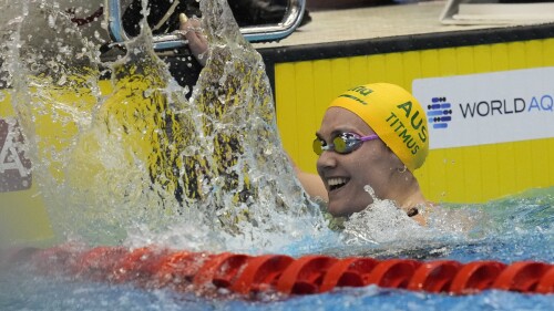 Ariarne Titmus of Australia celebrates after finishing Women 400m Freestyle finals at the World Swimming Championships in Fukuoka, Japan, Sunday, July 23, 2023. (AP Photo/Lee Jin-man)