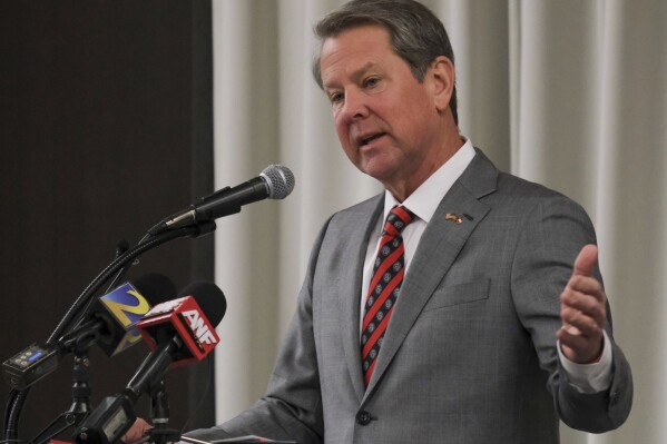 FILE - Georgia Gov. Brian Kemp speaks, Feb. 26, 2024, in Athens, Ga. Georgia lawmakers have made it harder for workers at companies getting state economic incentives to unionize, in what could be a violation of federal law. The state House voted 96 to 78 Wednesday, March 20, for Senate Bill 362, which would bar companies that accept state incentives from recognizing unions without a formal secret-ballot election. The measure, which has been backed by Gov. Kemp, now goes to the Republican governor for his signature. (Nell Carroll /Atlanta Journal-Constitution via AP, file)