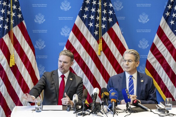 U.S. Trade Representative Jamieson Greer, left, and U.S. Secretary of the Treasury Scott Bessent take part in a press conference after two days of closed-door discussions on trade between the United States and China, in Geneva, Switzerland, Monday, May 12, 2025. (Jean-Christophe Bott/Keystone via AP)