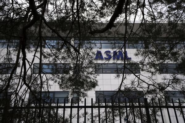 Exterior view of the head office of ASML, a leading maker of semiconductor production equipment, in Veldhoven, Netherlands, Monday, Jan. 30, 2023. ASML says the U.S., Dutch and Japanese officials are close to an agreement to limit China's access to the technology used to make computer chips. (AP Photo/Peter Dejong)