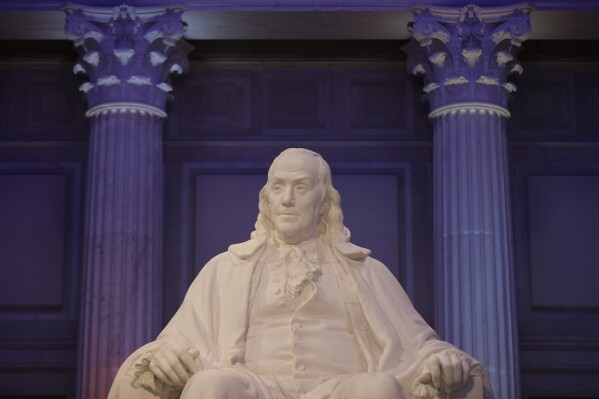 FILE - A statue of Benjamin Franklin is seen at The Franklin Institute, Tuesday, Feb. 10, 2015, in Philadelphia. Franklin, like some other key founders, admired Jesus as a moral teacher but would not pass a test of Christian orthodoxy. (AP Photo/Matt Rourke, File)