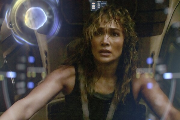 This image released by Netflix shows Jennifer Lopez in a scene from "Atlas." (Ana Carballosa/Netflix via AP)