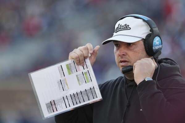 Mississippi State head coach Jeff Lebby reacts during the first half of an NCAA college football game against Mississippi, Friday, Nov. 29, 2024, in Oxford, Miss. (AP Photo/Rogelio V. Solis, File)