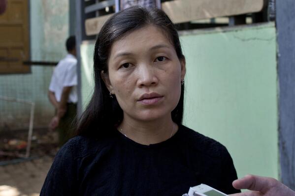 FILE - May Sabe Phyu, prominent human tights activist and wife of Patrick Kum Ja Lee, speaks to journalists after Patrick was convicted in Yangon, Myanmar, Jan. 22, 2016. Human rights activists including Phyu urged the U.N. Security Council on Monday, March 13, 2023 to refer Myanmar's military rulers to the International Criminal Court and urged neighboring Southeast Asian countries to support the opposition pro-democracy movement. (AP Photo/Gemunu Amarasinghe, File)