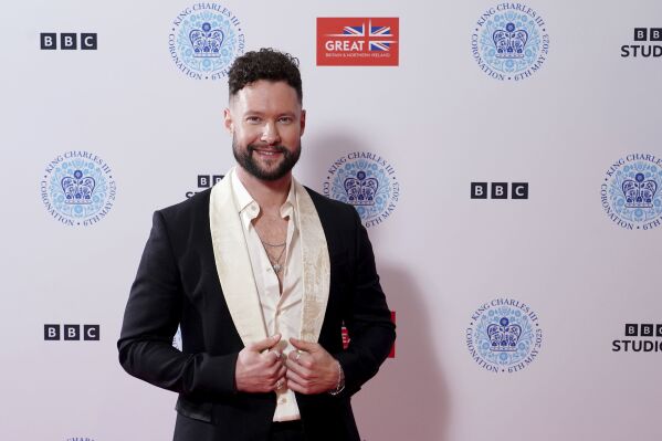 FILE - Calum Scott poses backstage at the Coronation Concert held in the grounds of Windsor Castle, Berkshire, to celebrate the coronation of King Charles III and Queen Camilla, Sunday May 7, 2023. Calum Scott never would have guessed his version of a song about a lonely, heartbroken person would become a postseason anthem for a team in America. But the English singer is ready to come to Philadelphia and sing "Dancing on My Own" should the Phillies win the World Series. (Ian West/Pool via AP, File)