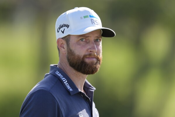 Chris Kirk walks off the 18th green after his round during the third round of The Sentry golf event, Saturday, Jan. 6, 2024, at Kapalua Plantation Course in Kapalua, Hawaii. (AP Photo/Matt York)