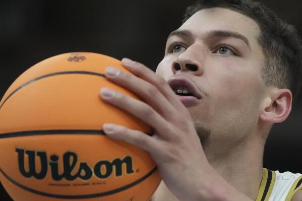 Purdue's Mason Gillis (0) shoots a free throw during the second half of an NCAA college basketball game against the Rutgers at the Big Ten men's tournament, Friday, March 10, 2023, in Chicago. (AP Photo/Erin Hooley)