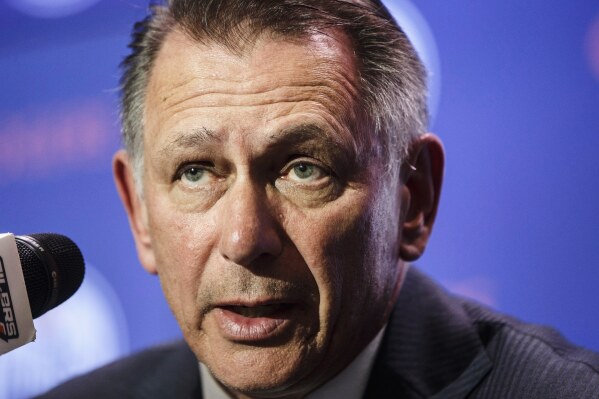 FIEL - Ken Holland speaks at an NHL hockey press conference in Edmonton, Alberta, Tuesday May 7, 2019. (Jason Franson/The Canadian Press via AP, File)