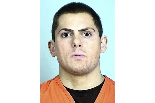 FILE - This booking photo released by Sherburne County Jail shows Anton Lazzaro. The formerly well-connected GOP donor convicted of giving teenage girls gifts, alcohol and money in exchange for sex was sentenced Wednesday, Aug. 9, 2023, to 21 years in prison. (Sherburne County Jail/Star Tribune via AP, File)