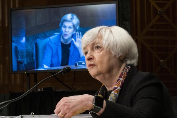 Sen. Elizabeth Warren, D-Mass., on monitor, questions Treasury Secretary Janet Yellen during a Senate Banking, Housing, and Urban Affairs Committee hearing, Tuesday, May 10, 2022, on Capitol Hill in Washington. (Tom Williams/Pool via AP)