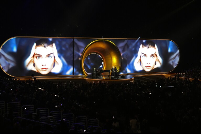 Annie Lennox pays tribute to Sinead O'Connor during the 66th annual Grammy Awards on Sunday, Feb. 4, 2024, in Los Angeles. (AP Photo/Chris Pizzello)