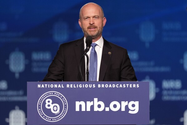 FILE - Kevin Roberts, president of The Heritage Foundation, speaks at the National Religious Broadcasters convention at the Gaylord Opryland Resort and Convention Center Feb. 22, 2024, in Nashville, Tenn. Roberts, the leader of a conservative think tank planning for a massive overhaul of the federal government says we are in the midst of “a second American Revolution” that will be bloodless “if the left allows it to be.” (AP Photo/George Walker IV, File)