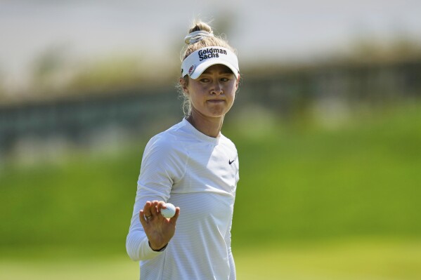 Nelly Korda reacts after finishing on the 18th green during the final round of the Mizuho Americas Open LPGA golf tournament, Sunday, May 11, 2025, in Jersey City, N.J. (AP Photo/Seth Wenig)