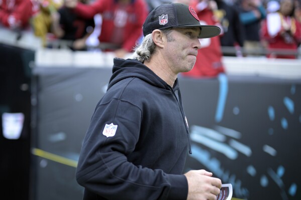 FILE -San Francisco 49ers nickels coach Nick Sorensen heads to the field before an NFL football game against the Jacksonville Jaguars, Sunday, Nov. 12, 2023, in Jacksonville, Fla. The San Francisco 49ers promoted assistant Nick Sorensen to defensive coordinator and hired former Los Angeles Chargers coach Brandon Staley for a role on the team's staff. A person familiar with the hirings confirmed them on Saturday, March 2, 2024 on condition of anonymity because the team hadn't made an announcement.(AP Photo/Phelan M. Ebenhack, File)