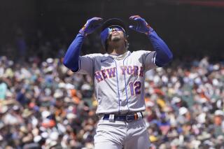 New York Mets' Francisco Lindor celebrates after hitting a home run against the San Francisco Giants during the sixth inning of a baseball game in San Francisco, Wednesday, May 25, 2022. (AP Photo/Jeff Chiu)