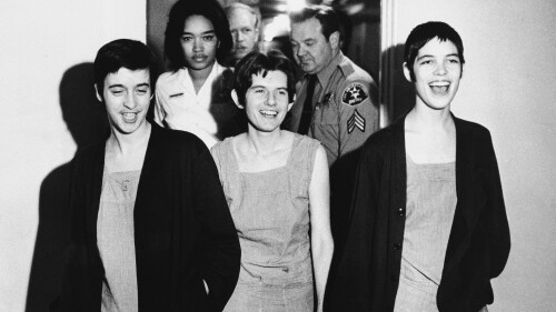 FILE - Three women co-defendants in the Sharon Tate murder case, from left, Susan Atkins, Patricia Krenwinkel and Leslie Van Houten, laugh as they walk to court in Los Angeles for sentencing on March 29, 1971. Van Houten, one of Charles Manson's followers, was released from prison on parole on Tuesday, July 11, 2023. (AP Photo/File)