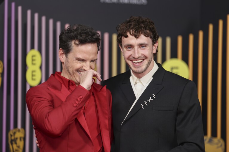 Andrew Scott, left, and Paul Mescal pose for photographers upon arrival at the 77th British Academy Film Awards, BAFTA's, in London, Sunday, Feb. 18, 2024. (Photo by Vianney Le Caer/Invision/AP)