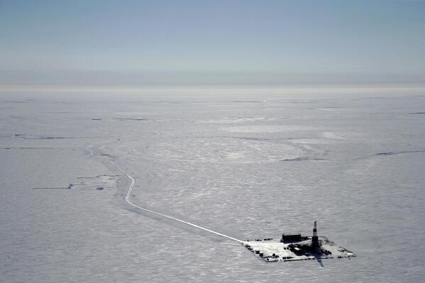 FILE - This 2019 aerial photo provided by ConocoPhillips shows an exploratory drilling camp at the proposed site of the Willow oil project on Alaska's North Slope. The Biden administration is weighing approval of a major oil project on Alaska's petroleum-rich North Slope that supporters say represents an economic lifeline for Indigenous communities in the region but environmentalists say is counter to Biden's climate goals. A decision on ConocoPhillips Alaska's Willow project, in a federal oil reserve roughly the size of Indiana, could come by early March 2023. (ConocoPhillips via AP, File)