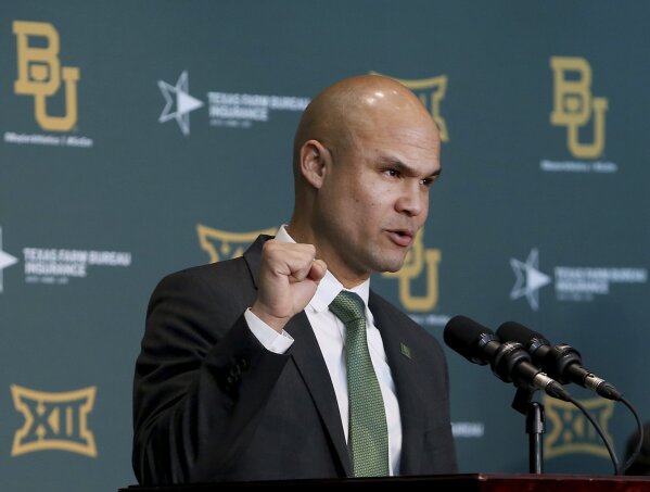 FILE - In this Jan. 20, 2020, file photo, Baylor's new head football coach Dave Aranda addresses the media during an NCAA college football news conference in Waco, Texas. Just when it seemed like things were up and rolling, the COVID-19 pandemic hit. The ensuring national shutdown hurt coaches across college football as they prepare for next season, but it was particularly difficult on programs with first-year coaches trying to build something from the ground up. (Jerry Larson/Waco Tribune-Herald via AP, File)