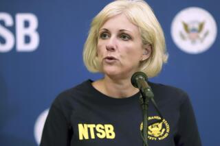 FILE - Jennifer Homendy of the National Transportation Safety Board, speaks during a news conference, Oct. 3, 2019, in Windsor Locks, Conn. Amid a sharp spike in traffic fatalities, Homendy, the chair of the National Transportation Safety Board, the nation’s top safety investigator, says a widely cited government statistic that 94% of serious crashes are solely due to driver error, is misleading and that the Transportation Department should stop using it. She told The Associated Press on Tuesday that she’s surprised the language remains on the department’s website. (AP Photo/Chris Ehrmann, File)