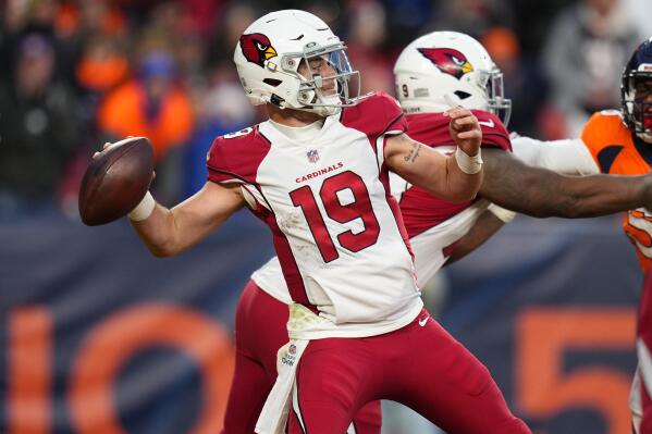 Arizona Cardinals quarterback Trace McSorley (19) throws against the Denver Broncos during the second half of an NFL football game, Sunday, Dec. 18, 2022, in Denver. (AP Photo/Jack Dempsey)