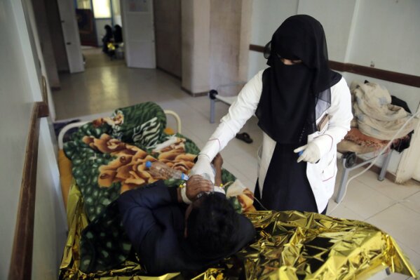 
              FILE - In this Thursday, March 28, 2019 file photo, a man is treated for suspected cholera infection at a hospital in Sanaa, Yemen. Cholera is surging once more in Yemen, with more than 76,000 suspected new cases and 195 deaths in March, double the number in the previous two months, according to U.N. figures. Doctors  point to the difficulty in controlling epidemics in a country where infrastructure has been decimated by four years of war. (AP Photo/Hani Mohammed, File)
            