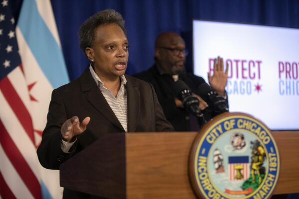 FILE - Chicago Mayor Lori Lightfoot speaks during a press conference at City Hall, Tuesday, Dec. 21, 2021, in Chicago. Chicago Mayor Lori Lightfoot says she has tested positive for COVID-19. The Democrat said Tuesday, Jan. 11, 2022, that she has "cold-like symptoms" but otherwise feels fine. (Erin Hooley/Chicago Tribune via AP)