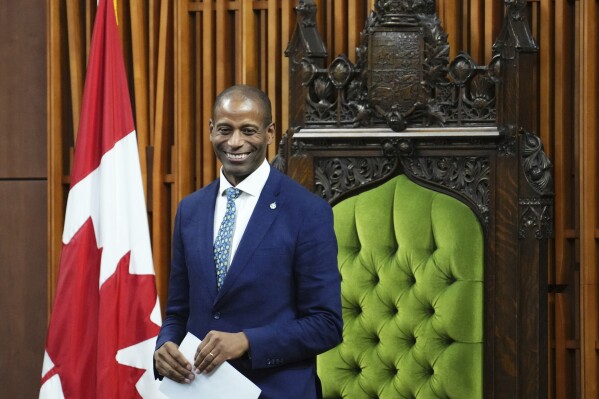 Newly elected Speaker of the House of Commons Greg Fergus smiles in the House of Commons on Parliament Hill in Ottawa, Ontario, Tuesday, Oct. 3, 2023. (Sean Kilpatrick/The Canadian Press via AP)