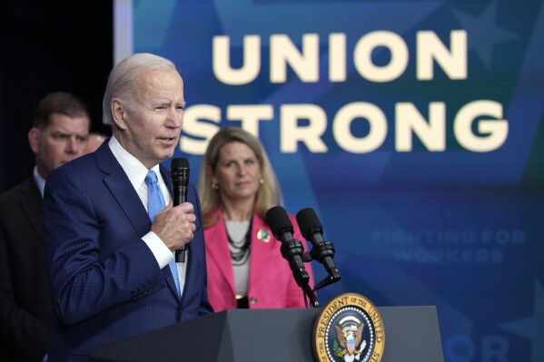 FILE - President Joe Biden speaks in the South Court Auditorium on the White House complex in Washington, Dec. 8, 2022, about the infusion of nearly $36 billion to shore up a financially troubled union pension plan. (AP Photo/Susan Walsh, File)