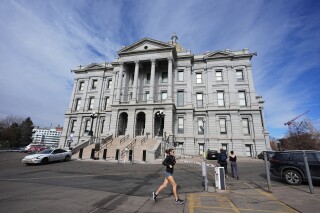FILE - The Colorado State Capitol is seen on Wednesday, Jan. 24, 2024, in Denver. The Democratic majority in Colorado's House pushed forward two bills Friday, March 1, 2024 protecting transgender people's chosen name. (AP Photo/David Zalubowski, File)