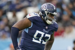 The Tennessee Titans waiving starting nose tackle Teart Tart, AP
