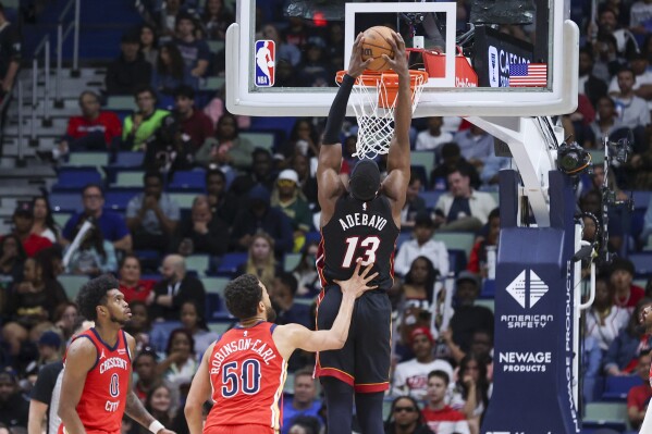 Adebayo has 23 points and 12 rebounds as the Heat pound the Pelicans 153-104. | AP News
