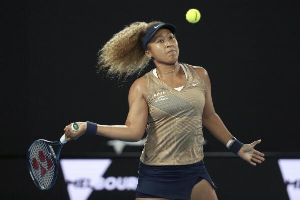 Naomi Osaka of Japan plays a forehand during the singles match against Andrea Petkovic of Germany, at Summer Set tennis tournament ahead of the Australian Open in Melbourne, Australia, Friday, Jan. 7, 2022. (AP Photo/Hamish Blair)