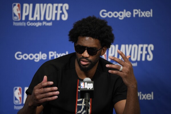 Philadelphia 76ers' Joel Embiid speaks during a news conference after Game 3 in an NBA basketball first-round playoff series against the New York Knicks, Thursday, April 25, 2024, in Philadelphia. (AP Photo/Matt Slocum)