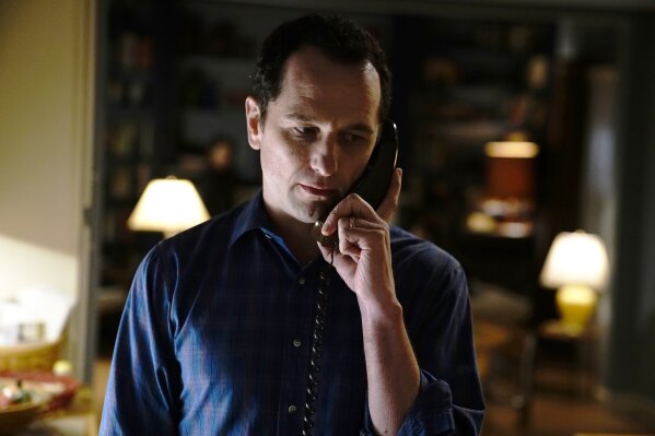 
              This image released by FX shows Matthew Rhys in a scene from "The Americans." Rhys is nominated for an Emmy for outstanding lead actor in a drama series. The 70th Emmy Awards will be held on Monday, Sept. 17. (Patrick Harbron/FX via AP)
            