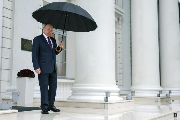 The prime minister and an umbrella