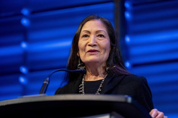 FILE - Interior Secretary Deb Haaland announces that her agency will work to restore more large bison herds during a speech for World Wildlife Day at the National Geographic Society in Washington, March 3, 2023. (AP Photo/Andrew Harnik, File)