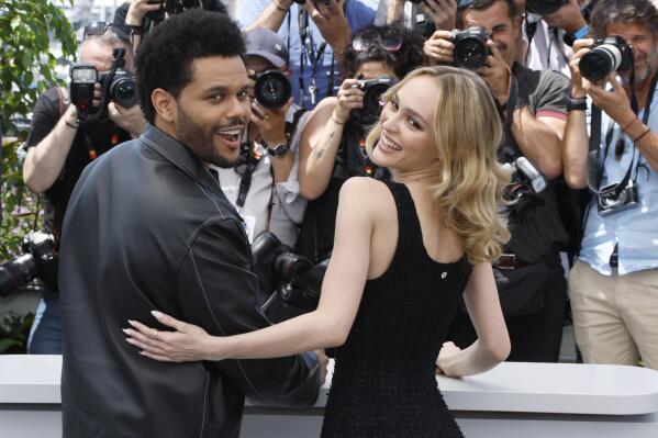Abel Tesfaye, left, and Lily-Rose Depp pose for photographers at the photo call for the television series 'The Idol' at the 76th international television series festival, Cannes, southern France, Tuesday, May 23, 2023. (Photo by Joel C Ryan/Invision/AP)