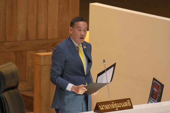 Thailand's Prime Minister Srettha Thavisin reads the policy statement at parliament in Bangkok, Thailand, Monday, Sept. 11, 2023. (AP Photo/Sakchai Lalit)