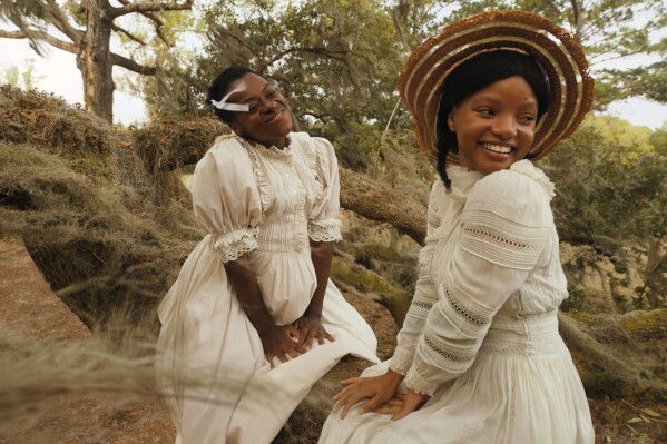 This image released by Warner Bros. Pictures shows Phylicia Pearl Mpasi, left, and Halle Bailey in a scene from 