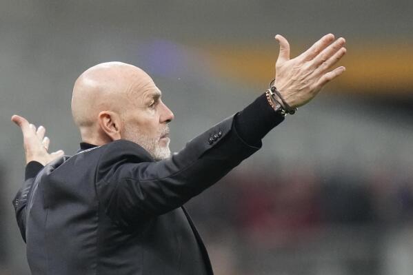 AC Milan's manager Stefano Pioli reacts during a Serie A soccer match between AC Milan and Salernitana at the San Siro stadium in Milan, Italy, Monday, March 13, 2023. (AP Photo/Luca Bruno)